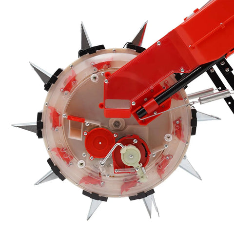 Close-up of Hand Push Seeder Planter Walk Behind Row Crop Planter With Adjustable Seeding Depth showing red and plastic construction