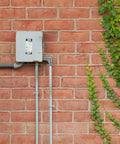 Heavy Duty 3/4 Inch Emt Conduit Fitting 90 Degree Inside Corner Pull Elbow Zinc Die Cast Raceway setup on brick wall.