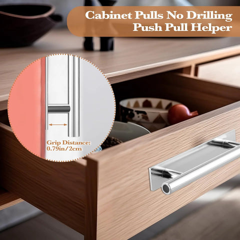 Open drawer with silver stick-on handle, focus on grip distance inset, part of 50 Pack Stick On Push Pull Drawer Pulls Adhesive Cabinet Handles ABS Plastic For Kitchen Cabinets Doors Furniture Silver No Tools Required Easy Peel And Stick Installation For Quick Cabinet Update.