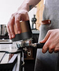 Automatic Espresso Tamper 58mm Electric Coffee Hammer With LCD Screen And Twenty Tamping Levels Rechargeable Barista Gear in use