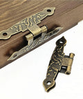 4Pcs Antique Vintage H Shaped Cabinet Door Hinges With Screws for Jewelry Boxes and Old School Furniture Decor on wood surface