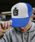Man wearing a royal blue and white Womens Yacht Style Hat Breathable Sun Cap with mesh back and slogan text