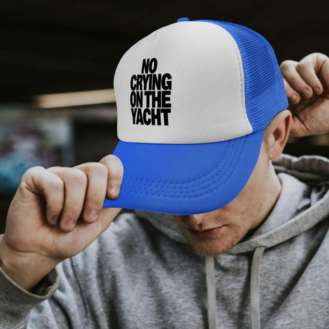 Man wearing a royal blue and white Womens Yacht Style Hat Breathable Sun Cap with mesh back and slogan text
