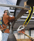 Worker on steel beam using Heavy Duty Fall Protection Strap Set, 2 Pack, 6 Foot Cross Arm Anchor Straps With Double D Rings.
