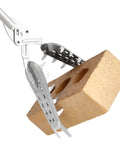 Heavy Duty 49 Inch Grabber Reacher Tool with Laser Welded Frame holds a brick with strong stainless steel grip.