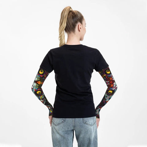 Back view of woman wearing Top Tier Ice Silk Cooling Arm Sleeves With Bold Fantasy Prints stays cool while gardening.