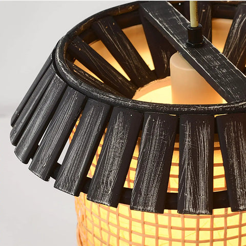 Close-up of Massive Staircase Chandelier With Eight Bamboo Shades And Long Adjustable Drop, showcasing natural bamboo shade details.