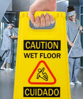 Caution Wet Floor Sign Yellow Double Sided A Frame, Bilingual Foldable Safety Sign 17.12 x 8.38 x 0.94 Inches in use in a public area