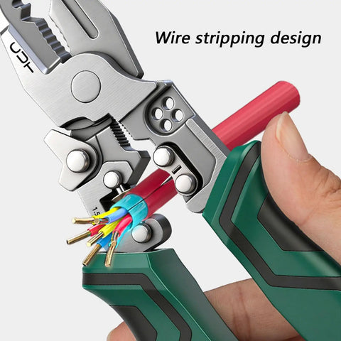 Premium Rigid Solid Steel Wire Stripper Tool With Built In Voltage Tester gripping insulated wire, close up on cutting jaws.