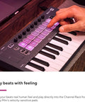 Person using Portable 25 Key MIDI Keyboard Controller with USB Connectivity and FL Studio Integration for beat making
