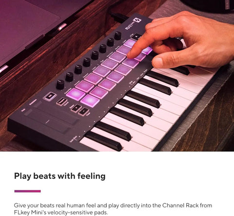 Person using Portable 25 Key MIDI Keyboard Controller with USB Connectivity and FL Studio Integration for beat making