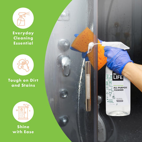 Person using All Purpose Cleaner Spray For Home And Kitchen Multipurpose Multisurface Cleaner For Glass Countertops Appliances Upholstery And More Unscented 32oz Pack Of 2 on glass surface.