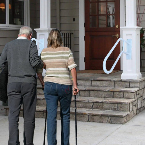 A Straight Up Rock Solid Wall Mounted Handrail Grab Bar For Indoor And Outdoor Steps, heavy duty white steel railing installed at porch steps.