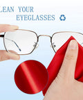 Microfiber cleaning cloth for glasses, red, 6x7 inch, shown wiping eyeglasses.