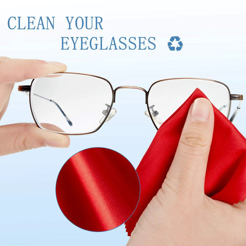 Microfiber cleaning cloth for glasses, red, 6x7 inch, shown wiping eyeglasses.