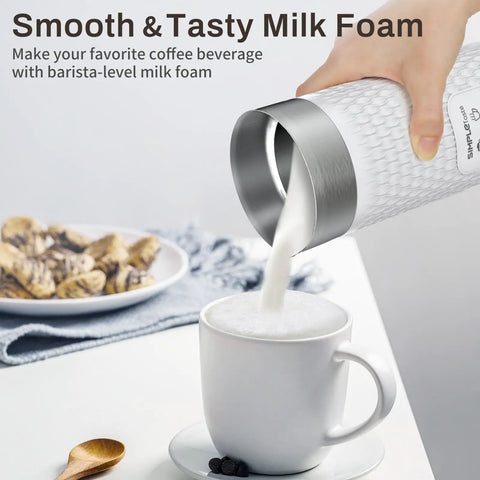 Pouring milk from 4 In 1 Electric Milk Frother And Warmer For Lattes And Cappuccinos into cup, white foam for coffee drinks