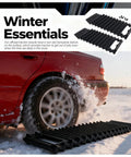 Heavy Duty 2 Pack Car Tire Traction Mats Featuring Non Slip Grip And Compact Handles Versatile Winter Recovery Tracks, in snow below a spinning tire.