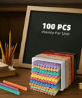 Colorful Dustless Chalk Set 100 Pieces In 10 Rich Colors Non Toxic For Classrooms Teachers And Students Kid Tested And Classroom Friendly For Chalkboards And Whiteboards Everyday Learning displayed on a desk with pencils and a chalkboard.