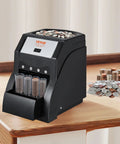 Efficient US Coin Sorter And Wrapper Machine With Four Large Coin Tubes, Sorts Pennies Nickels Dimes Quarters, Pro Grade Performance Handles Up To 230 Coins Per Minute, Black on table, coin piles visible