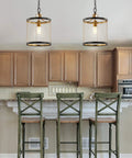 10-Inch Black And Brass Gold 1-Light Iron Pendant Lanterns over kitchen island, modern drum hanging lights, LED bulb included.