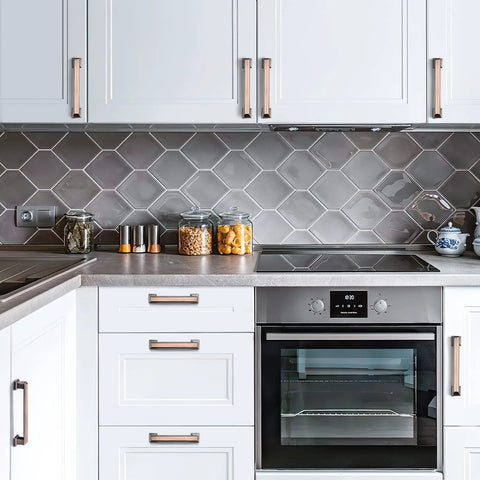 Modern kitchen with 5 Inch Brushed Antique Copper Cabinet Hardware Pulls And Knobs Set For Kitchen And Furniture on white cabinets.