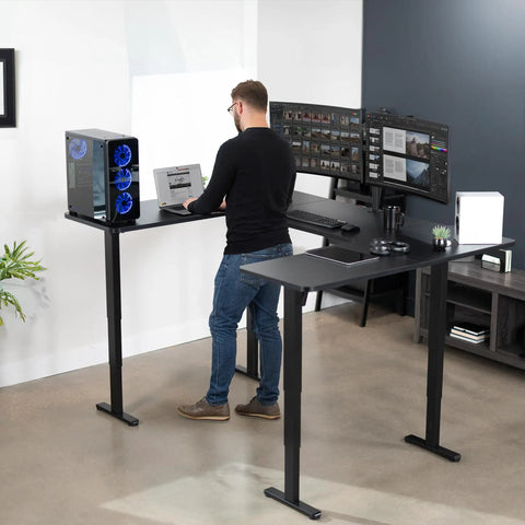 Rock Solid U Shaped Standing Desk Converters 83 By 60 Inches Black Sit Stand Converter for dual monitors in a modern workspace.