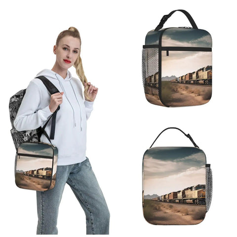 Person carrying Insulated Lunch Bag With Detachable Handle For Women And Men, Leakproof Cooler Tote with desert train print.