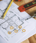 Check out this awesome kit of 50 premium M12x24x2mm flat copper gaskets perfect for sealing heavy-duty fastening tasks and solid electrical connections while handling tough environments with total ease. Brass washers on blueprint with drill and tape measure