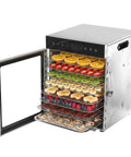 Stainless Steel Electric Food Dehydrator With 12 Trays Boasts A Smooth 24 Hour Digital Timer And Precise Heat Control Up To 195 Degrees Using Fast Dual Fan Flow For Bulk Jerky Fruits Veggies And Dog Treats Done Right filled with dehydrating fruits on trays.