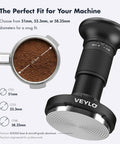 53.3mm espresso tamper adjacent to filled portafilter, showcasing 54mm Espresso Tamper With Adjustable 20 To 30 Lb Dial Audible Click Feedback 24 Dial Steps Top Notch Precision 20 25 30 Lb Marks No Spring Swap Stainless Steel Flat Base Black