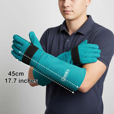 Heavy Duty Animal Handling Gloves For Training Dogs Cats Birds Snakes Parrots Lizards Reptiles Bite Proof Protection With Seventeen Point Seven Inch Leather Gloves Blue Grip Ready Anti Scratch For Safer Handling, shown on a person