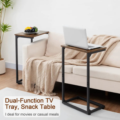 C Shaped End Tables Set Of 2 That Slide Under Your Sofa next to a tan sofa with a laptop and fruit, Model HET02BBR.