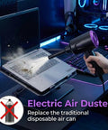 Electric Air Duster And Blower For Keyboard, PC And Electronics cleaning a laptop keyboard on a desk.