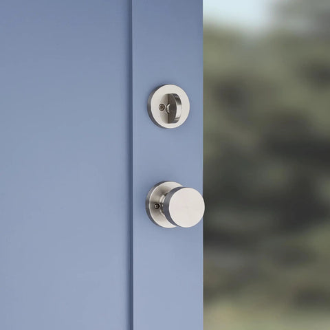 Prague Front Door Lock Handle And Deadbolt Set With Satin Nickel Finish on blue door, exterior entry handleset and interior knob visible