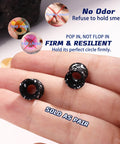 Black speckled Silicone Ear Gauges 00G Double Flared Plugs Set resting on a hand with text highlighting features.