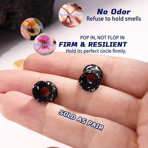 Black speckled Silicone Ear Gauges 00G Double Flared Plugs Set resting on a hand with text highlighting features.