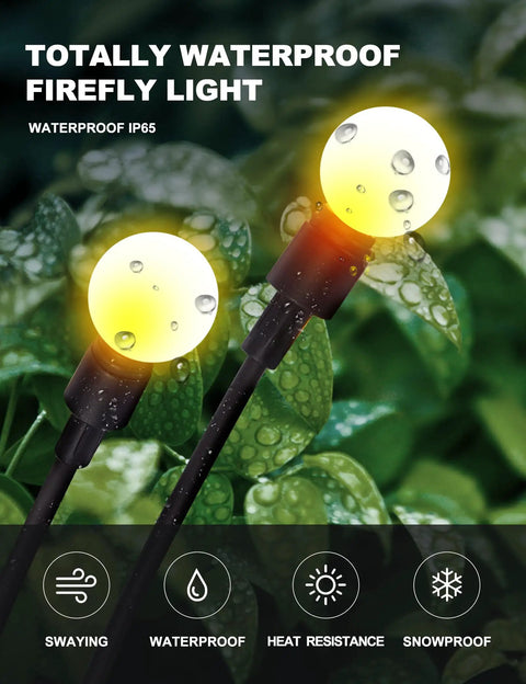 10 LED Starburst Solar Firefly Lights For Outdoors With Swaying Motion shown lit against green foliage, waterproof and IP65 rated.