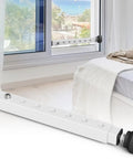 Adjustable Inside Window Security Bar For Horizontal And Vertical Sliding Windows Extends 11 To 18 Inches White Finish Easy Install In Window Lock Bar That Keeps Sliding Windows Secure While Allowing Air Flow, shown in installed position on sliding window with view outside.