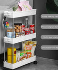 No Sweat Rolling Utility Cart With Smooth Slide Out Storage Rack And Reinforced Hook Compact Mobile Shelving Organizer Fits Narrow Slots Easy Tool Free Assembly For Bathroom Or Kitchen with snacks and drinks on three tiers.