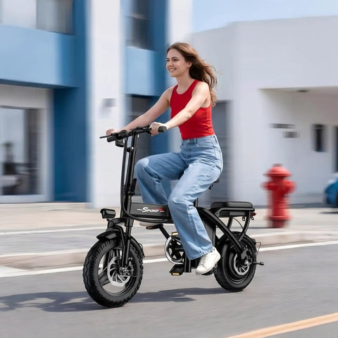 Woman riding powerful 1200W peak motor foldable ebike for adults with 25 MPH top speed and 45 mile PAS range in urban setting