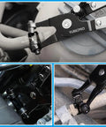 Close-up of 130-Piece Spring Band Hose Clamp Kit With Pliers For 6-25mm Clamps Range on various hoses.