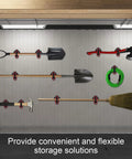 Magnetic Shovel Holder For Trucks And SUVs, No Drill Quick Release Roof Rack Mount securing tools on a garage wall.