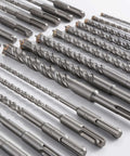 Five-piece set of 3/8-in concrete drill bits with carbide tips, arranged in rows (top-down view).