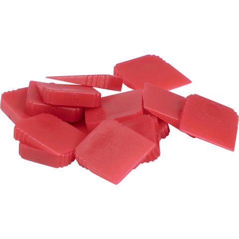 Precision Tile Wedges Set 450 Pack With Built In Gripper For Easy Removal shown in red plastic wedges pile