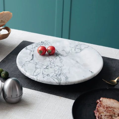 12 Inch Solid Marble Lazy Susan Turntable With Buttery Smooth Swivel Base For Zero Fuss Kitchen Countertop Organization, showcasing tomatoes.