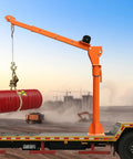 Heavy Duty 1100 Lb Truck Bed Crane Hoist With Electric Winch lifting a red barrel, showcasing adjustable jib length and swiveling base.
