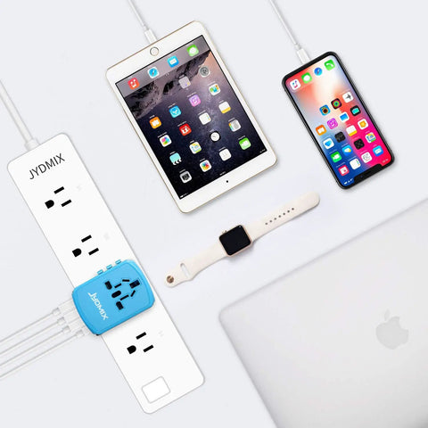 Universal USB Travel Power Adapter With Quad USB Ports And Type C for Worldwide Charging connected to multiple devices
