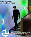 No Fuss Rechargeable Motion Sensor Lights Indoor With Magnetic Rgb Wall Sconces Auto On Off Night Light For Closets Hallways And Steps Plug And Play Vibe Sweet No Sweat Setup 2 Pack Solid Build. User walking by RGB sconces on stairs.