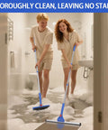 2 In 1 Floor Cleaning System With V Shaped Scrub Brush And Foam Squeegee For Tiles Marble Glass Bathrooms Kitchens Garages Grout And Pet Hair Cleanup Deep Clean And Fast Dry in use by two people in a bathroom.