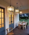 Battery Operated Chandelier With Acrylic Crystal Beads Waterproof Hanging Pendant Lights Dimmable Timer For Patio Decor Two Pack installed outdoors.